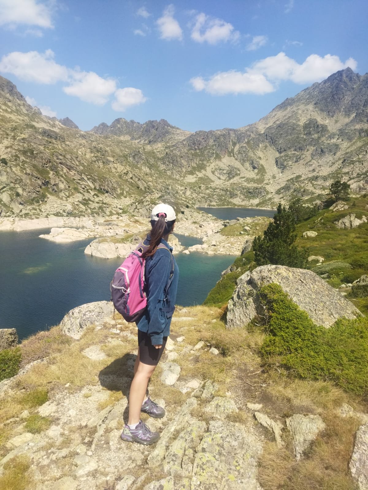 Solo female traveller hiking in the mountains of Andorra